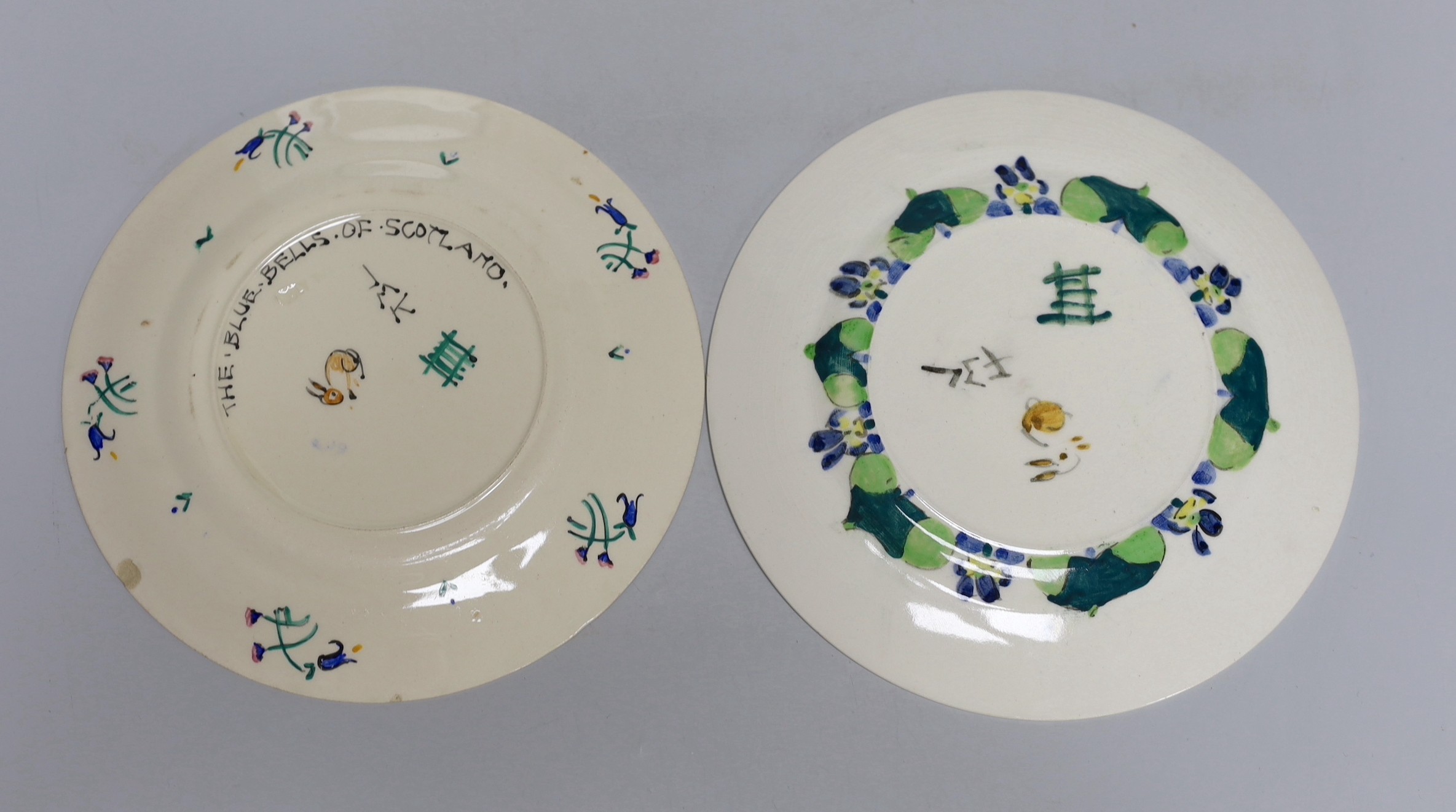 Jessie Marion King (1875-1949), four various floral design tea plates and three tea cups